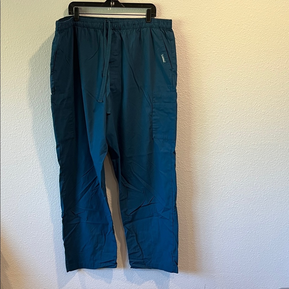 Blue men’s landau scrub pants. Extra extra large, zipper fly, and drawstring
